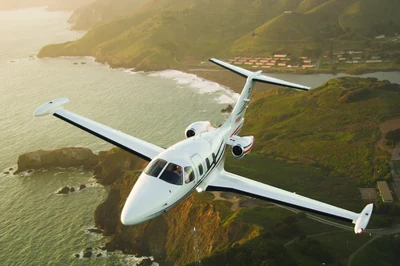 Very light jet aircraft in flight.