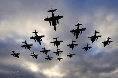 Sixteen Harrier Aircraft Fly in Formation to Mark Retirement from Service (UK)